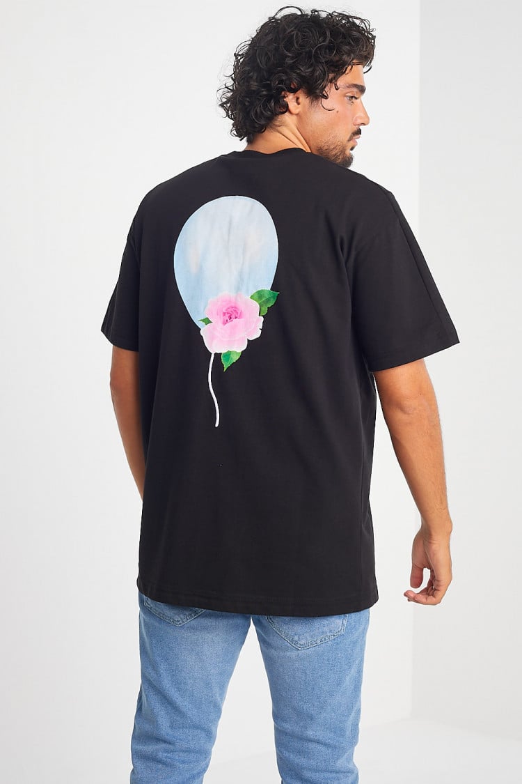 T-shirt noir à motif ballon et fleur