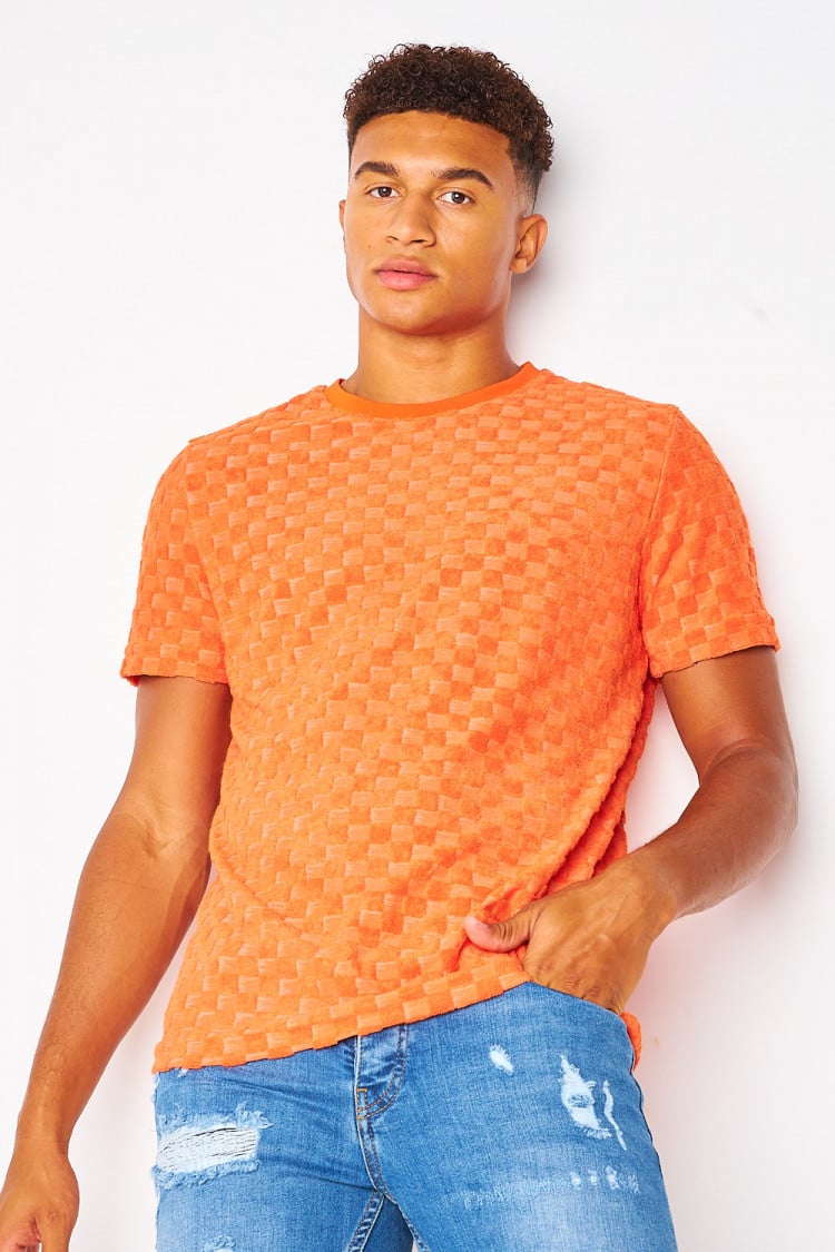 T-shirt orange imprimé damier en relief