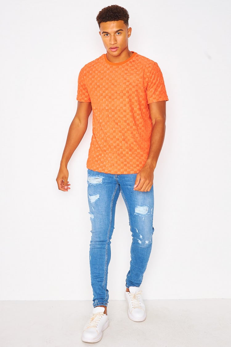 T-shirt orange imprimé damier en relief