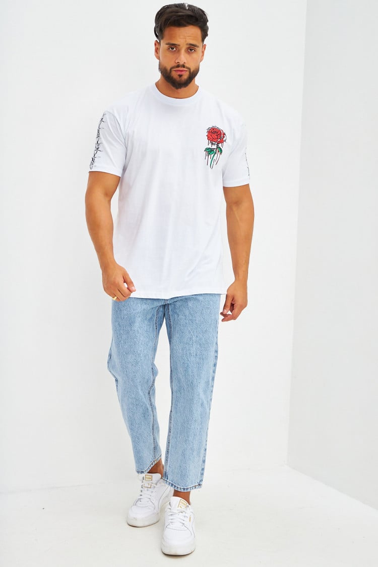 T-shirt oversize floqué rose barbelé blanc