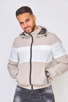 Veste à capuche beige et blanche