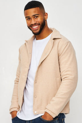 Veste beige col à rabats