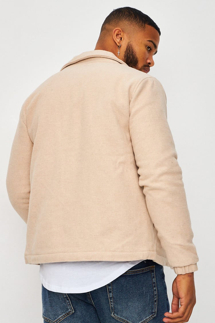 Veste beige col à rabats