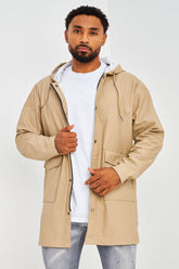 Veste mi-longue beige foncé à capuche en simili cuir mat